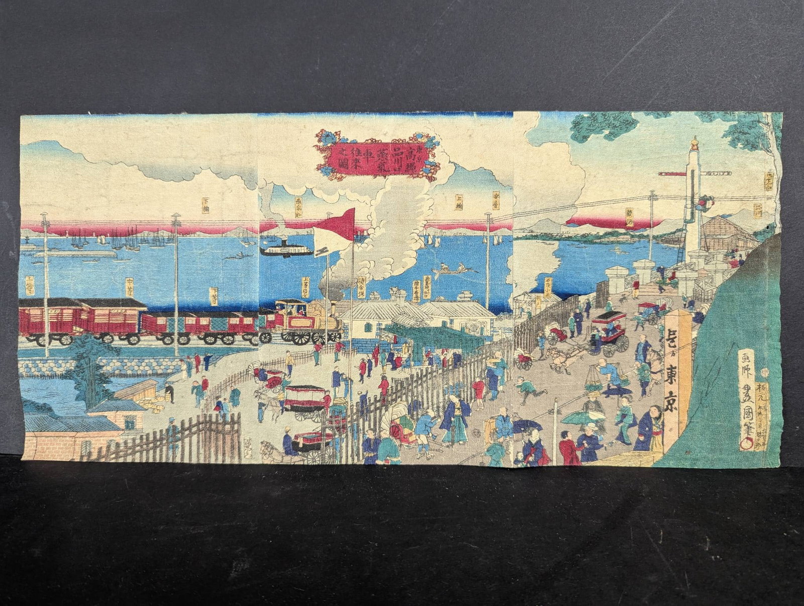 Japanese Woodblock PrintÂ Shinagawa Rail Road StationÂ by Utagawa Kunisada II 19: Original 19th-century Japanese woodblock print on creped chirimen paper measuring 17.5 inches in height and 8 inches in width. The artwork exhibits minor creasing, typical of its age. This piece is at