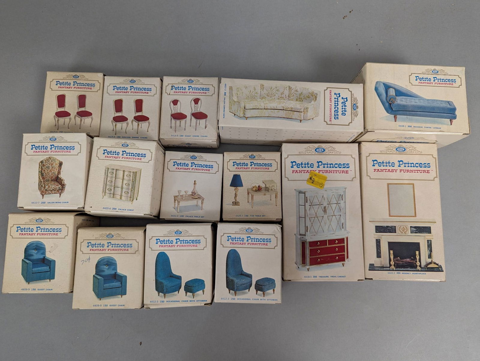 Petite Princess Fantasy Furniture Dollhouses in Boxes: Petite Princess Fantasy Furniture, designed for dollhouses. Includes sets of chairs, sofas, tables, cabinets, and accessories such as lamps and fireplaces. Each piece features individual packaging wit