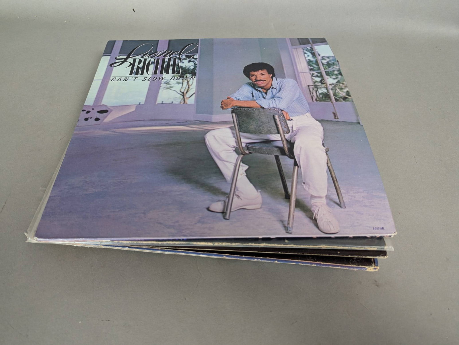 10 Vinyl Records Featuring Lionel Richie Bob Marley Grand Funk Railroad etc: 10 vinyl records from a single estate, featuring a well-maintained collection that includes albums by Lionel Richie, Bob Marley, The Spinners, Grand Funk Railroad, The 5th Dimension, and more. The rec