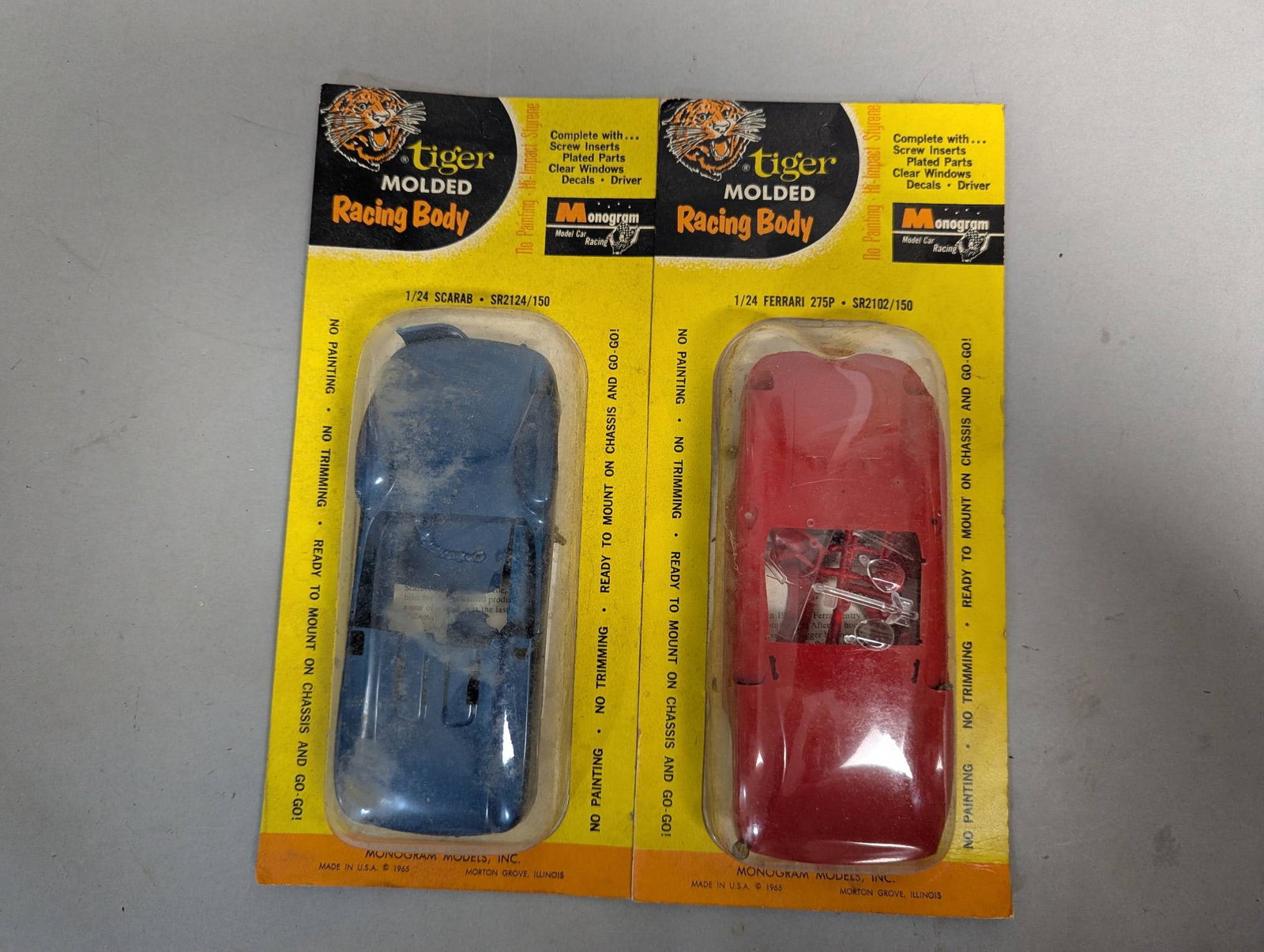 Monogram Tiger Molded Racing Body Ferrari 275P Scarab 1965 NIP: Monogram Tiger Molded Racing Body kits from 1965, consisting of a 1/24 scale Ferrari 275P (SR2102/150) and a 1/24 scale Scarab (SR2124/150). Each package includes screw inserts, plated parts, clear wi