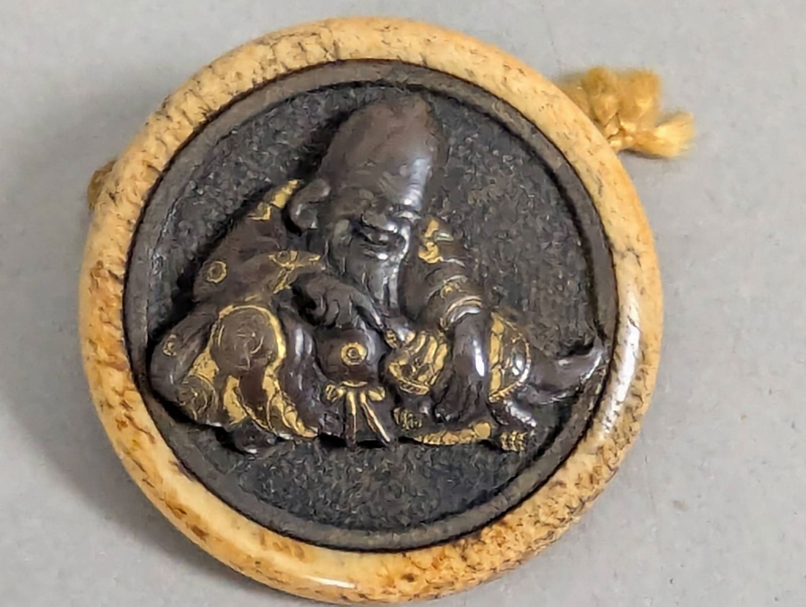 Bronze and Stag Horn Netsuke Depicting Elder with Fish (1 of 5)