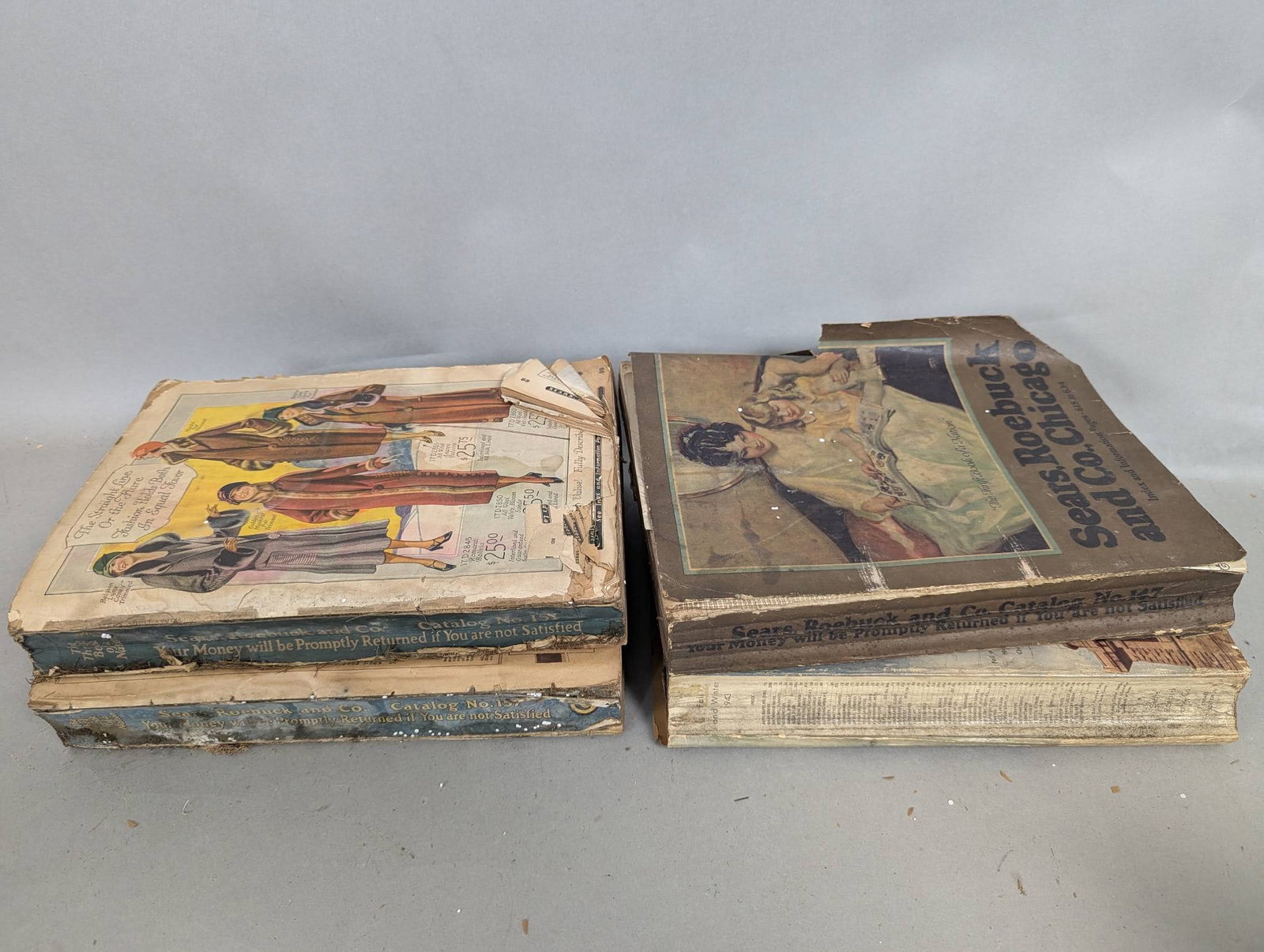 Sears Roebuck Catalog Lot No 147 151 147 1943-44 Winter: Sears Roebuck catalogs including No 147, No 151, another No 147, and the Winter 1943-44 edition. Dimensions for each catalog are approximately 8 1/2 inches high, 11 inches wide, and 2 inches deep. The