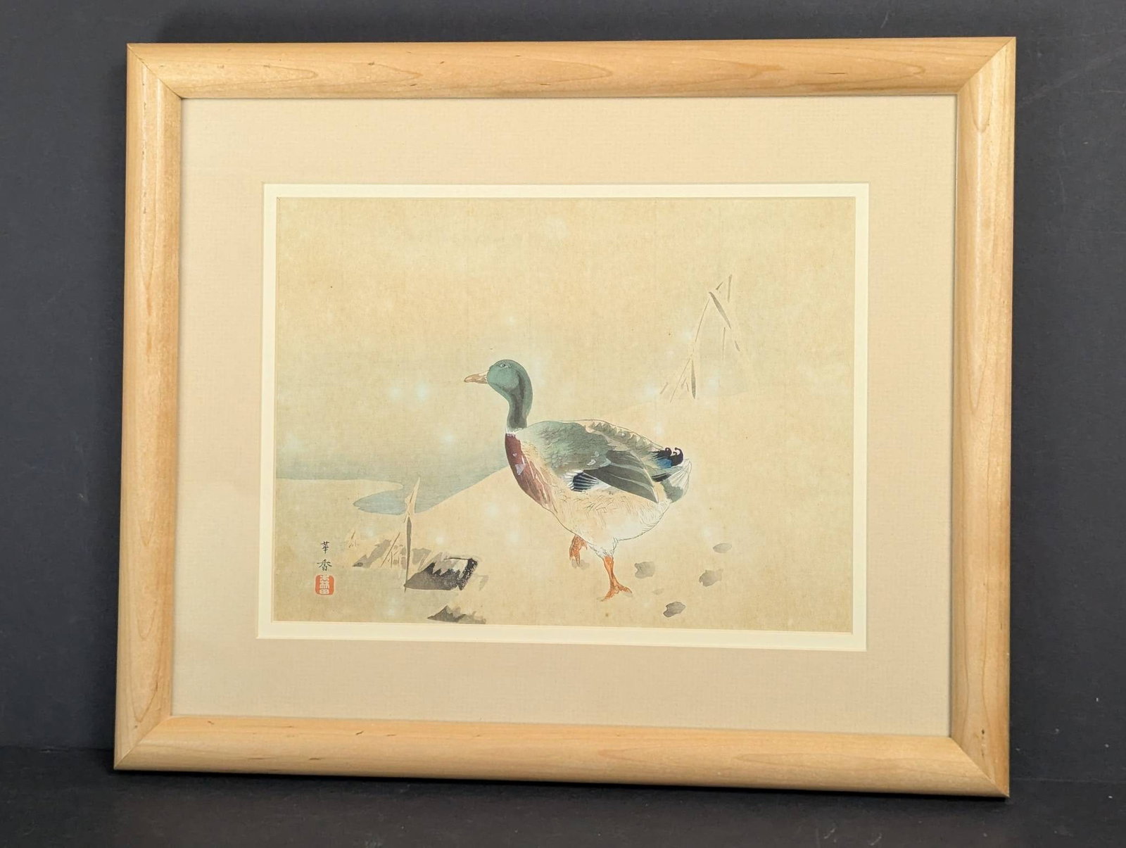 Signed Japanese Woodblock Print of a Duck in Natural Setting: A signed Japanese woodblock print depicting a duck in a natural setting. The print measures 16 inches high by 13 1/2 inches wide, with the image itself measuring 10 inches high by 8 inches wide. The a