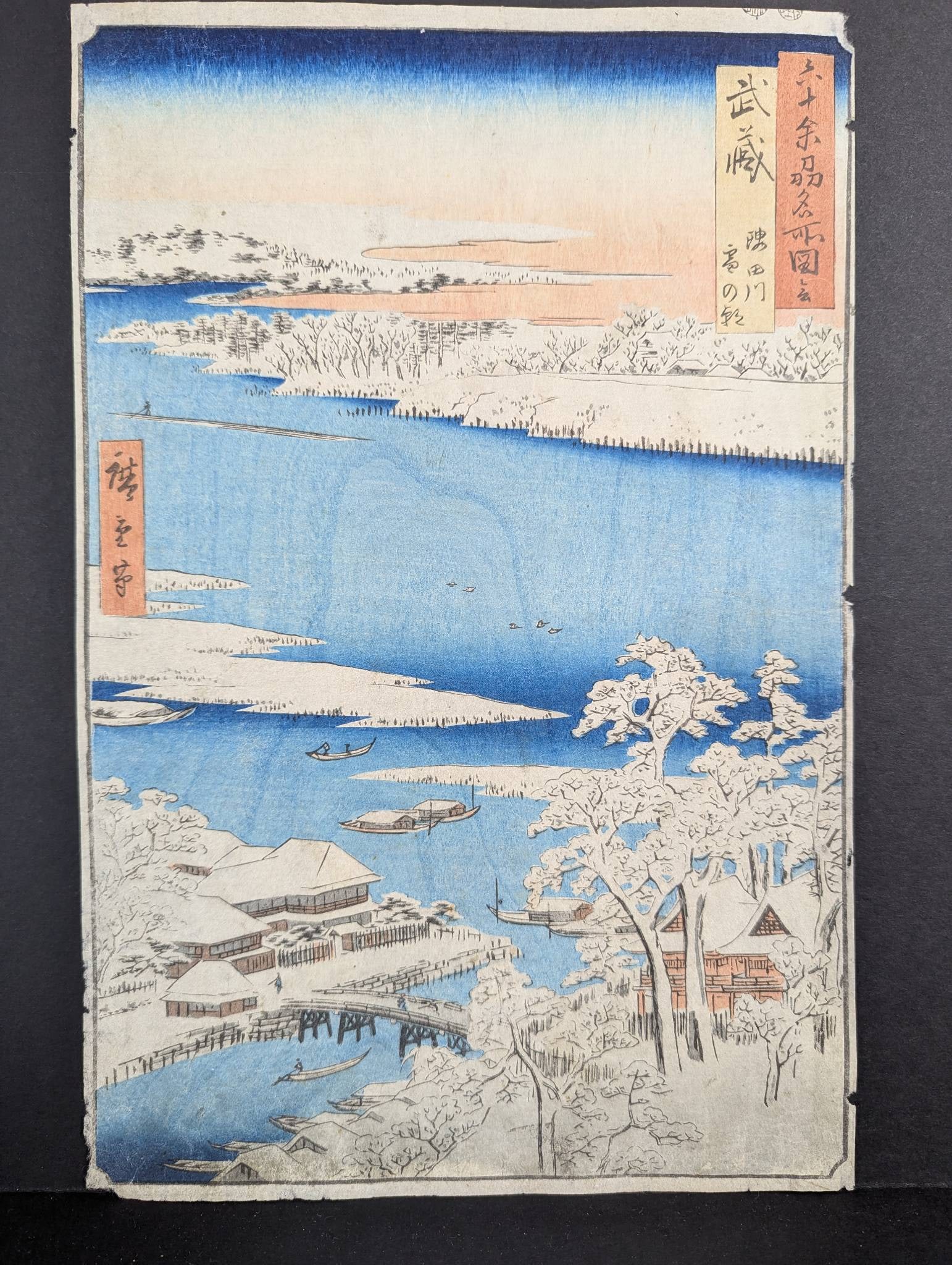 Japanese Woodblock Print by Ando Hiroshige Featuring Sumida River Original 19th Century: Japanese woodblock print by Ando Hiroshige (1797-1858) titled Musashi Province Sumida River, Snowy Morning. Created in 1858 as part of the Famous Places in the Sixty-odd Provinces series. Features a s