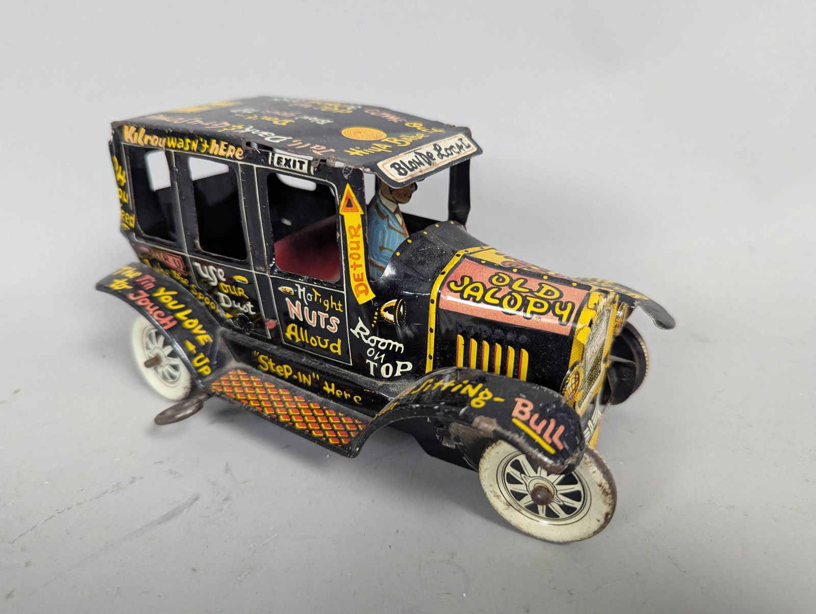 Marx Tin Lithographed Old Jalopy Wind-Up Toy Car with Driver Figurine (1 of 6)