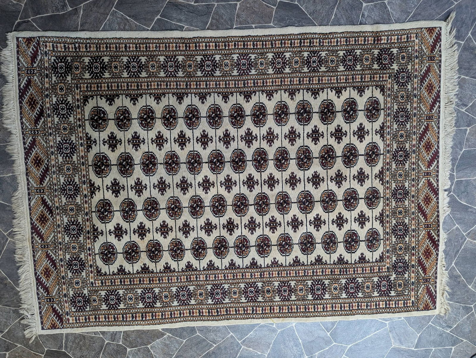 Bokhara Rug with Repeating Octagonal Medallion Design and Ivory Background (1 of 7)