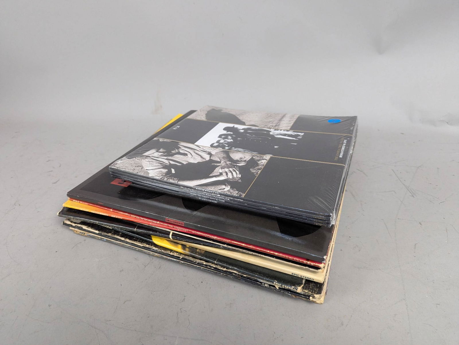 12 Vinyl Albums Featuring Iconic Bands and Artists from Various Genres (1 of 4)