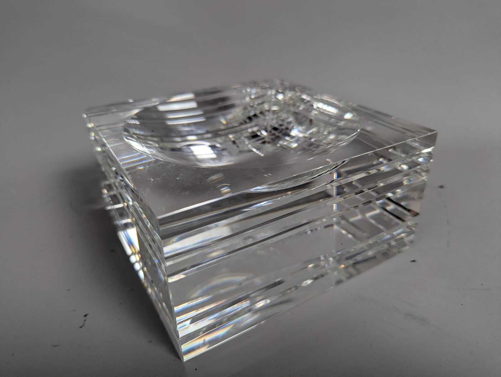 Veritas Glass Diamond Etched Convex Bowl: A Veritas glass convex bowl with diamond etching, featuring a striking layered design. The piece measures 6 high, 6 wide, and 3 deep. Constructed with clear glass, this item exemplifies precision craf