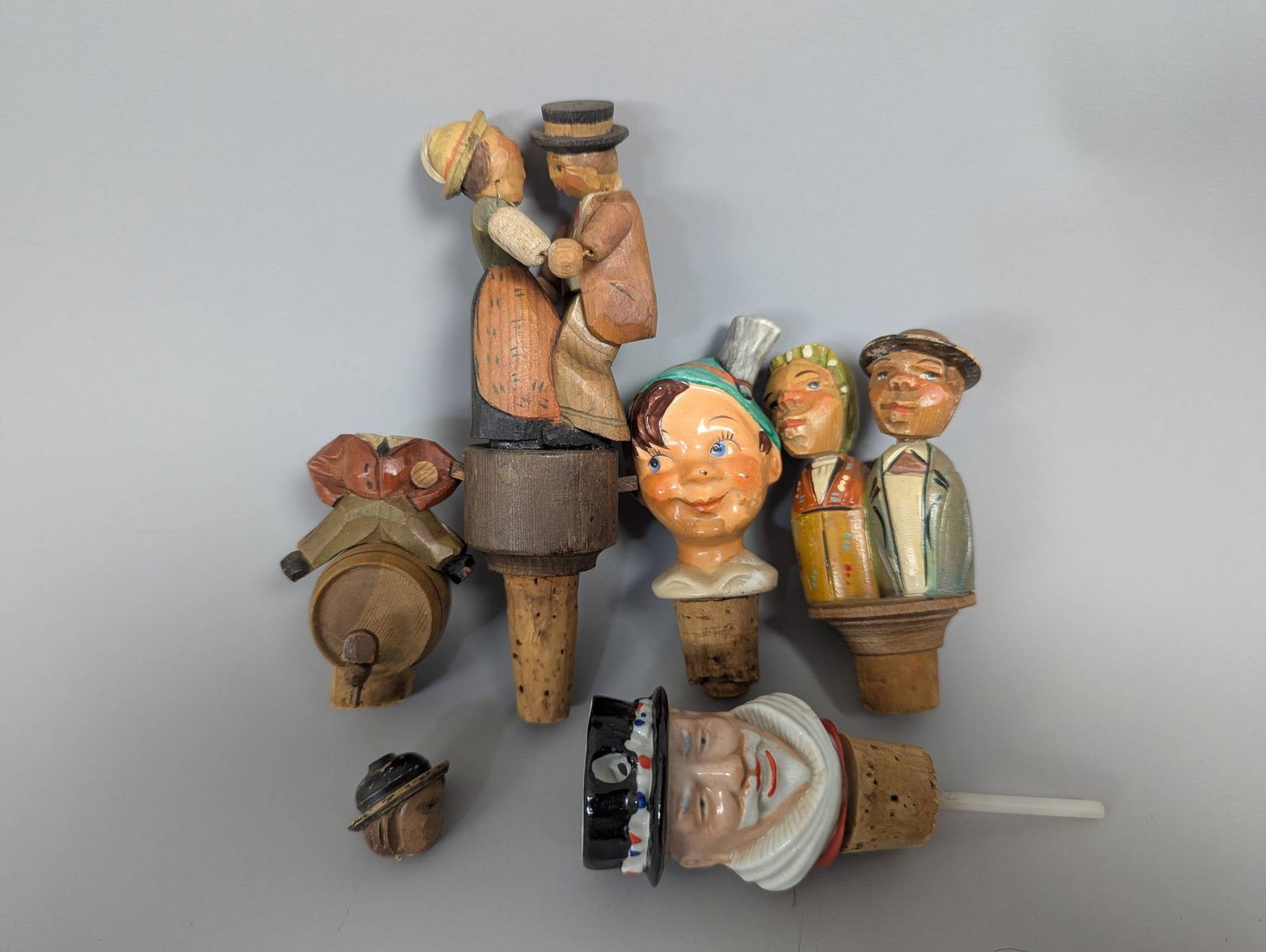 5 Antique German Carved Wood and Ceramic Bottle Stoppers (1 of 7)