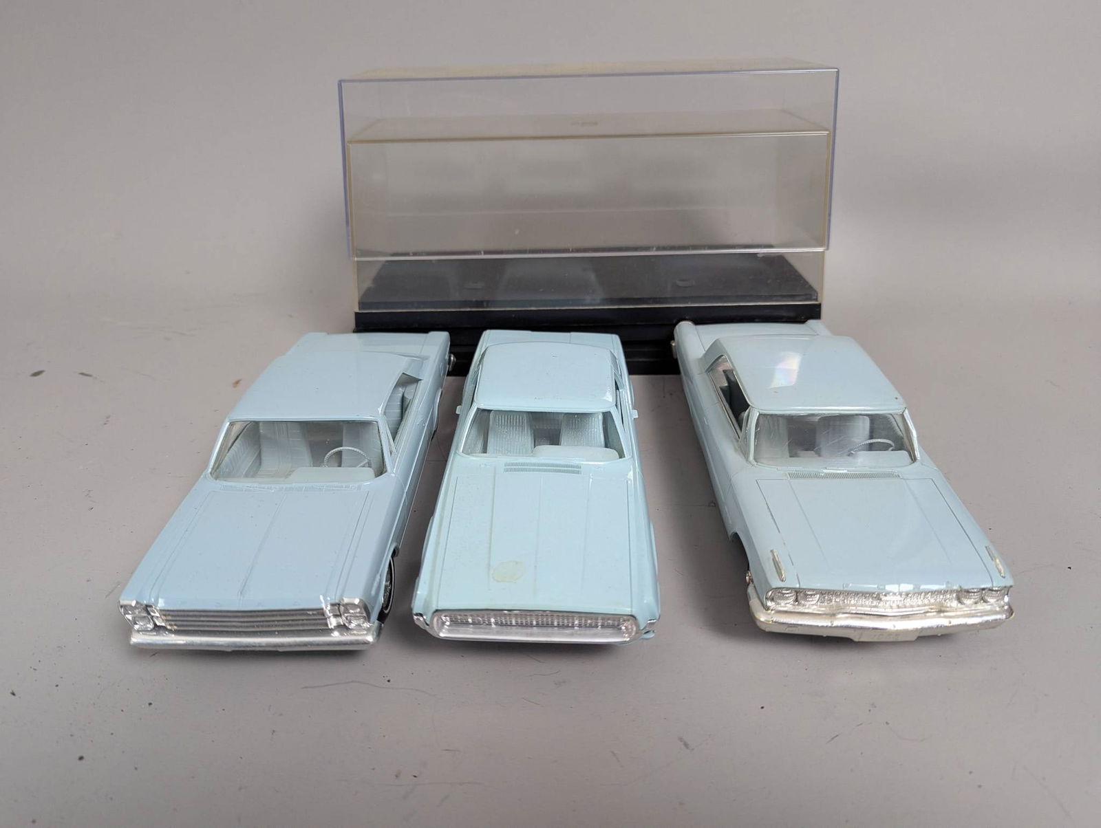 Three Ford Promo Model Cars in Powder Blue with Display Cases (1 of 8)