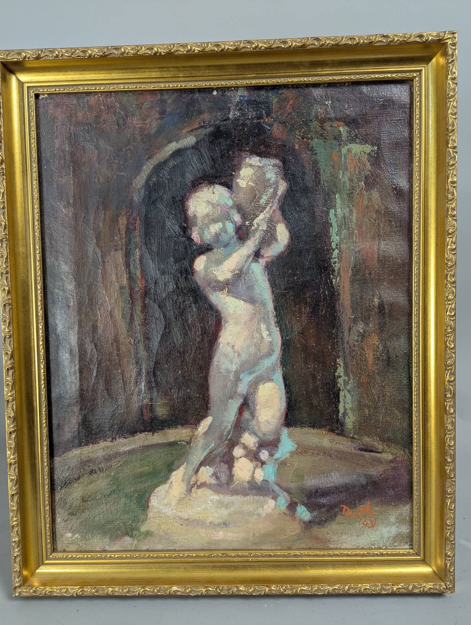 Oil Painting Depicting Nude Cherub Garden Statue Signed and Dated 1931: An oil painting on canvas measuring 19 inches high by 23 inches wide, with an image size of 16 inches high by 20 inches wide. The piece portrays a nude cherub garden statue, signed in the lower right 