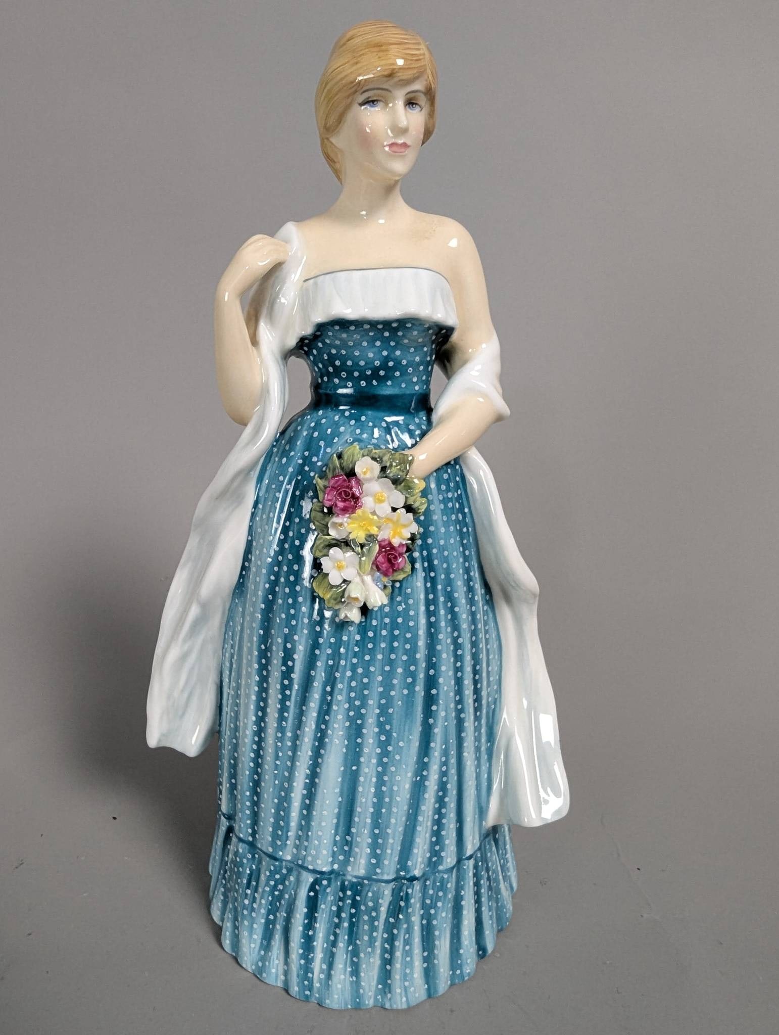 Royal Doulton HN 2885 Lady Diana Spencer Edition 1196 of 1500: Royal Doulton HN 2885 porcelain figurine depicting Lady Diana Spencer. Number 1196 in a limited worldwide edition of 1500. The piece stands 8 inches high, crafted with fine details, including a blue p
