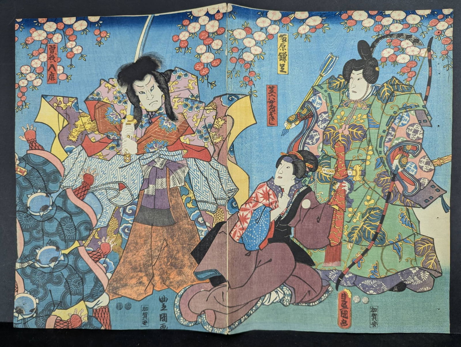 Japanese Woodblock Print by Toyokuni III Depicting a Dramatic Scene Original 19th Century: Original 19th-century Japanese woodblock print by Toyokuni III, also known as Kunisada. The artwork portrays a colorful and dramatic scene with several figures in elaborate attire. Blossoming cherry t
