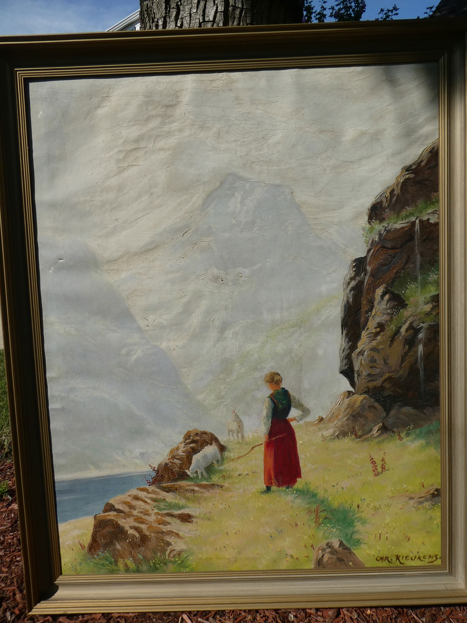 Charles Kleukens Woman Herding Goats Oil Painting: Charles Kleukens Woman Herding Goats Oil Painting on canvas in frame Has a couple paint chips and hole in middle of canvas 41 x 51, image: 37 x 47 Shipping: Local pick-up or buyer-arranged welcome.