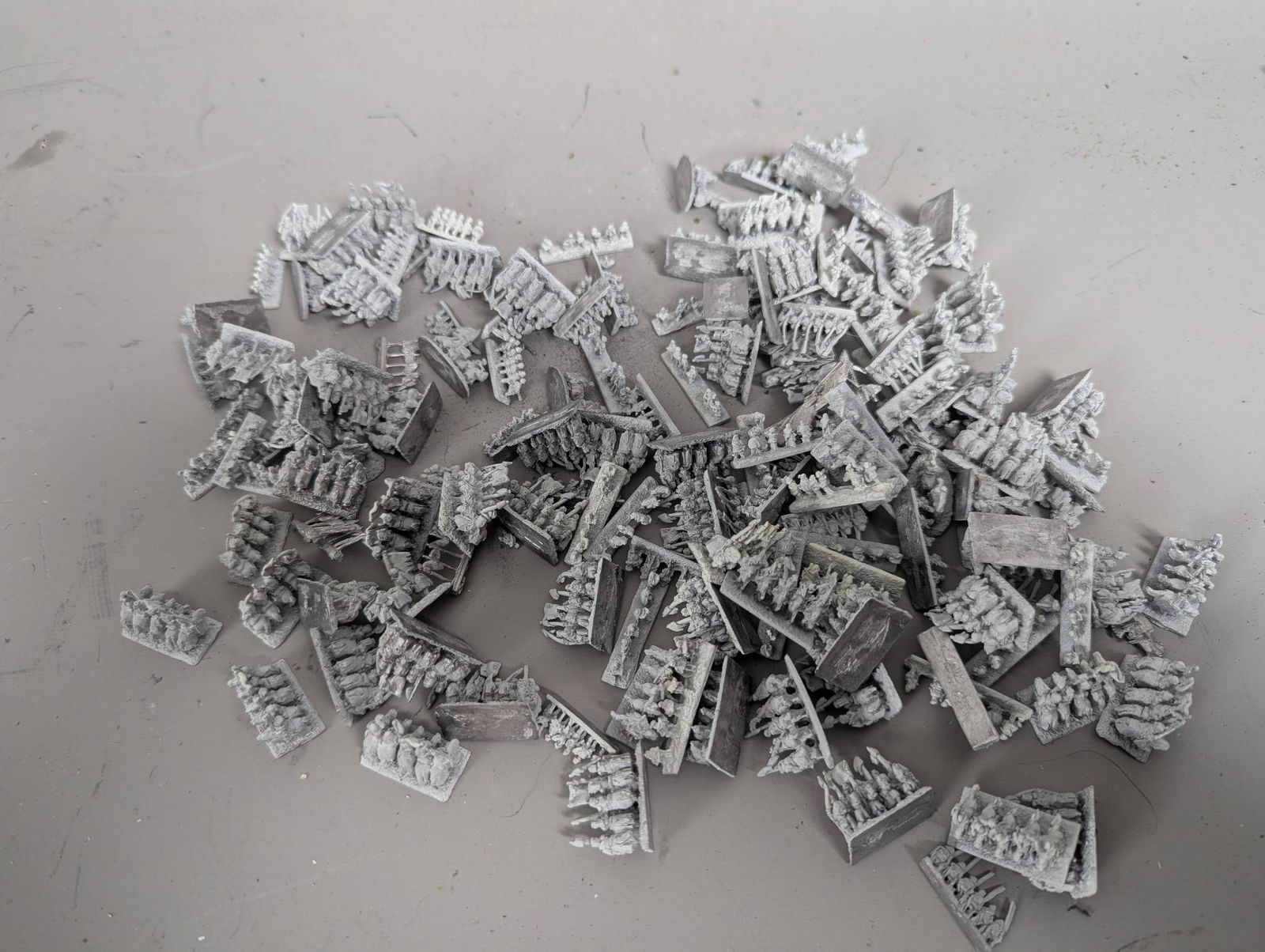 French and English Metal Miniatures From 100 Year War: Extensive collection of over 120 metal miniatures representing French and English forces from the 100 Year War, rendered at an approximate scale of 1/300. This lot includes individually detailed figur