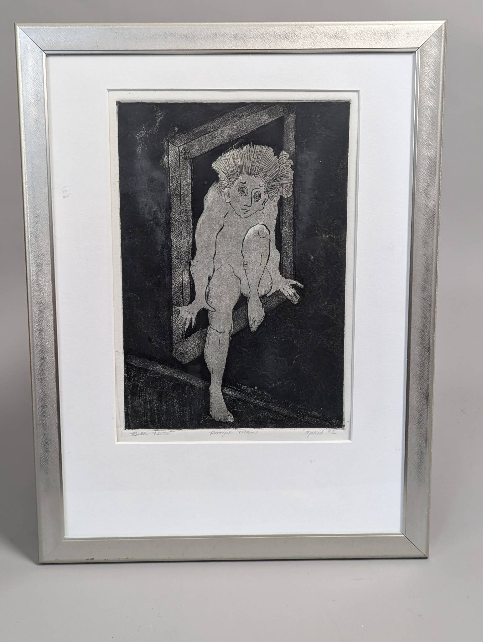 Etching Titled Boogie Man by Beth Ford: Original etching titled Boogie Man by artist Beth Ford, dated April 1992. The artwork measures 7 inches high by 10 inches wide within a visible image area and is framed to overall dimensions of 12 1/2