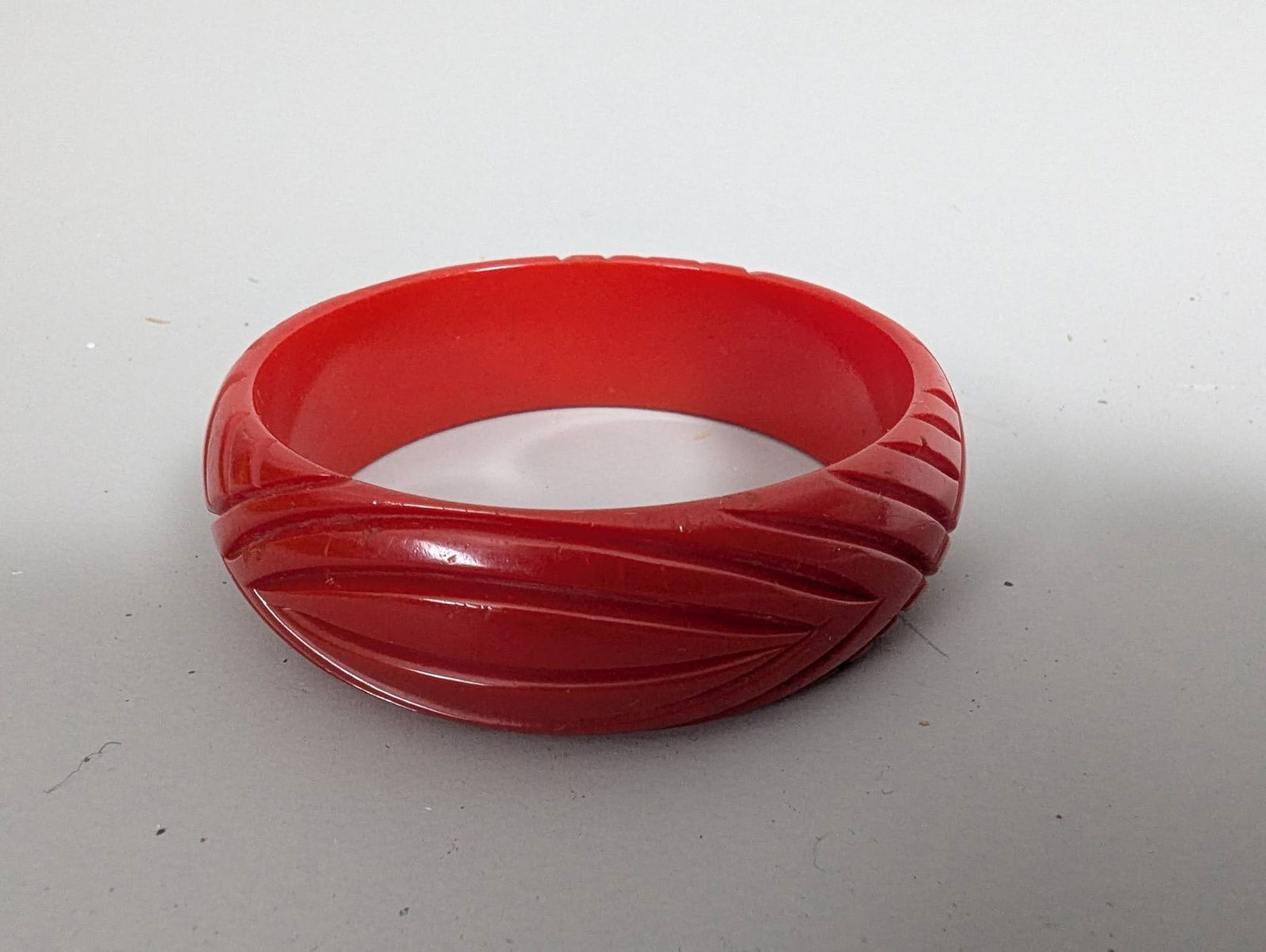 Carved Cherry Red Bakelite Bangle Bracelet with Leaf Design (1 of 3)