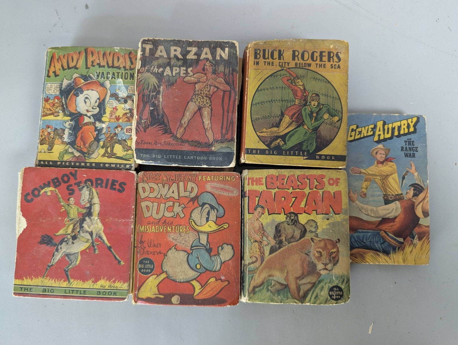 7 c 1940s Childrens Books Including Big Little Books: Seven childrenâ€™s books dating to approximately the 1940s, a mix of Big Little Books and others. Titles included are Roy Rogers and the New Cowboy Detective, Donald Duck and the Lost