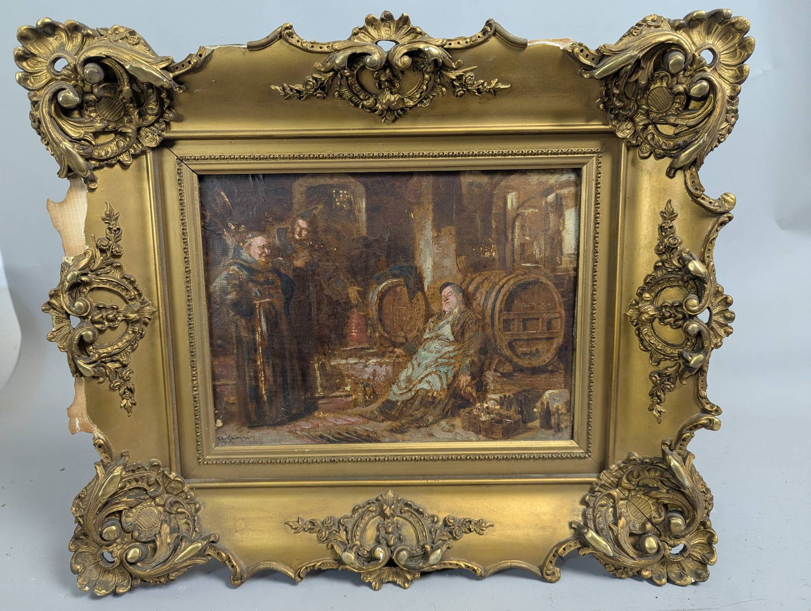 Oil on Canvas in Manner of Eduardo Von Grutzner Drunk Monks: Framed oil on canvas depicting a rustic interior scene featuring three figures and wine barrels, reminiscent of the style of Eduardo Von Grutzner. The painting shows visible impasto and fine detailing