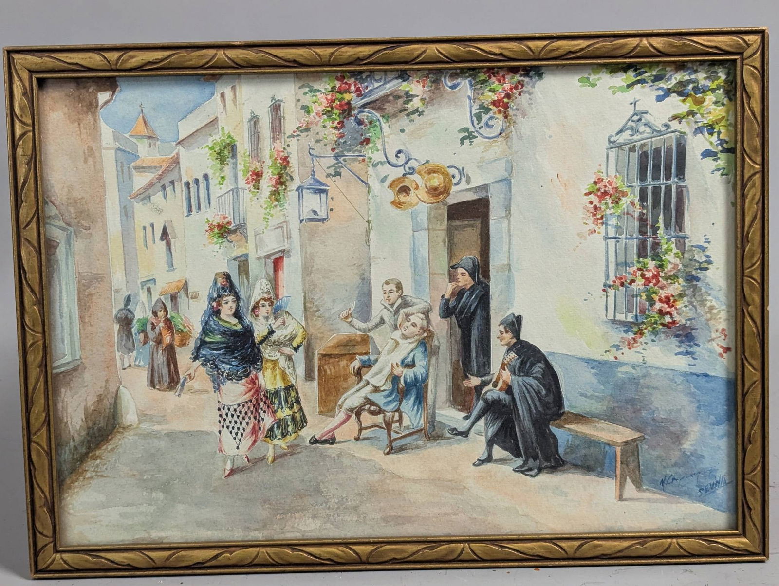 Early 20th Century Watercolor Depicting Scene from The Barber of Seville by N Charparteguy: Early 20th century watercolor depicting a lively street scene themed after The Barber of Seville. Signed N Charparteguy or similar. The artwork features a vibrant depiction of figures in colorful
