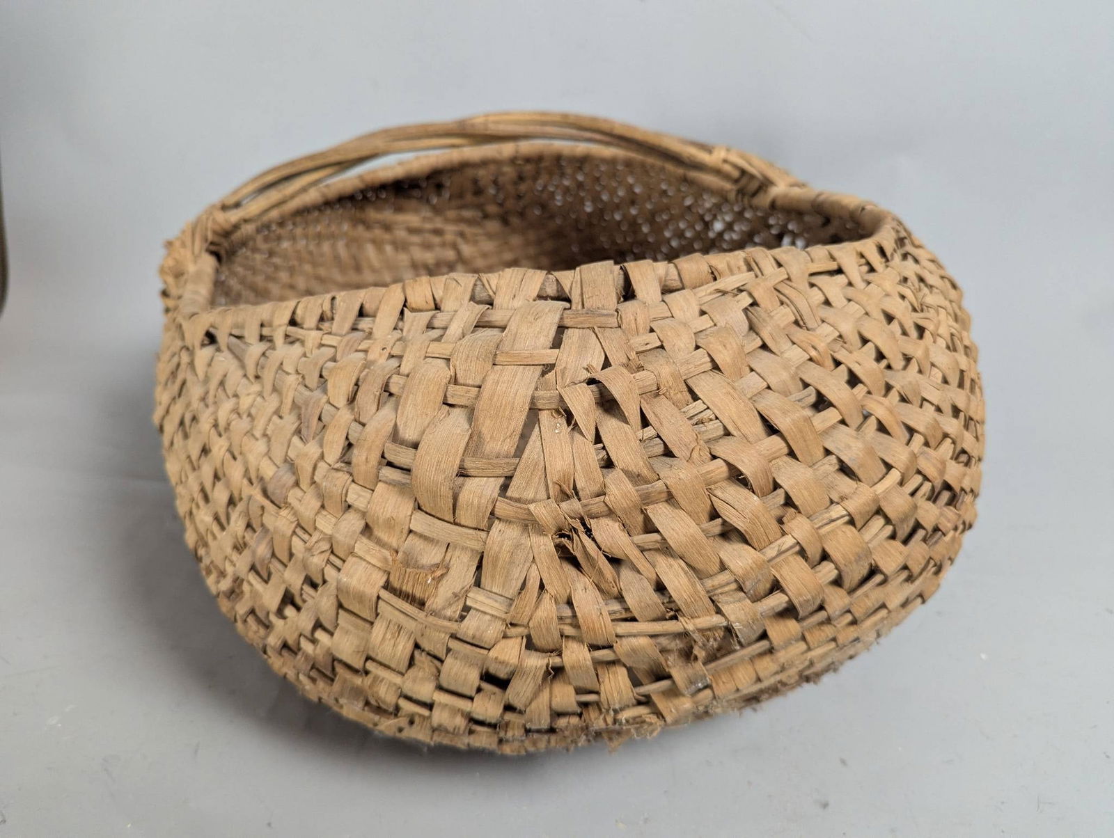 Antique Hand-Woven Buttocks or Gathering Basket with Arched Handle - 5