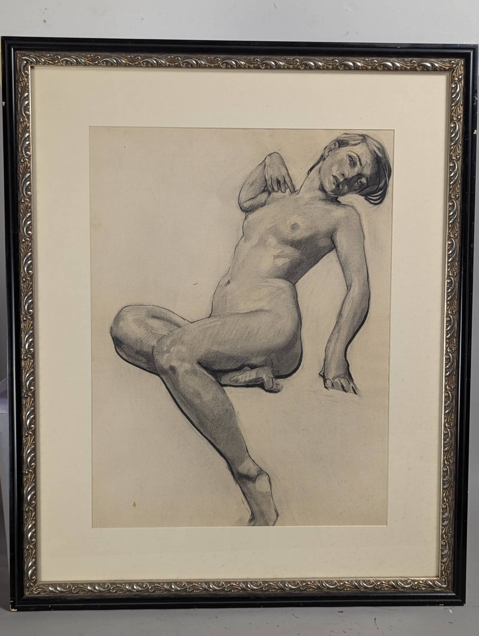 Charcoal on Paper Artwork Depicting Wilma Seated Attributed to Augustus Dunbier: Charcoal drawing on paper attributed to Augustus Dunbier titled Wilma Seated. The artwork measures 25 inches high by 19 inches wide, with a frame size of 27 1/2 inches high by 33 1/2 inches wide. The