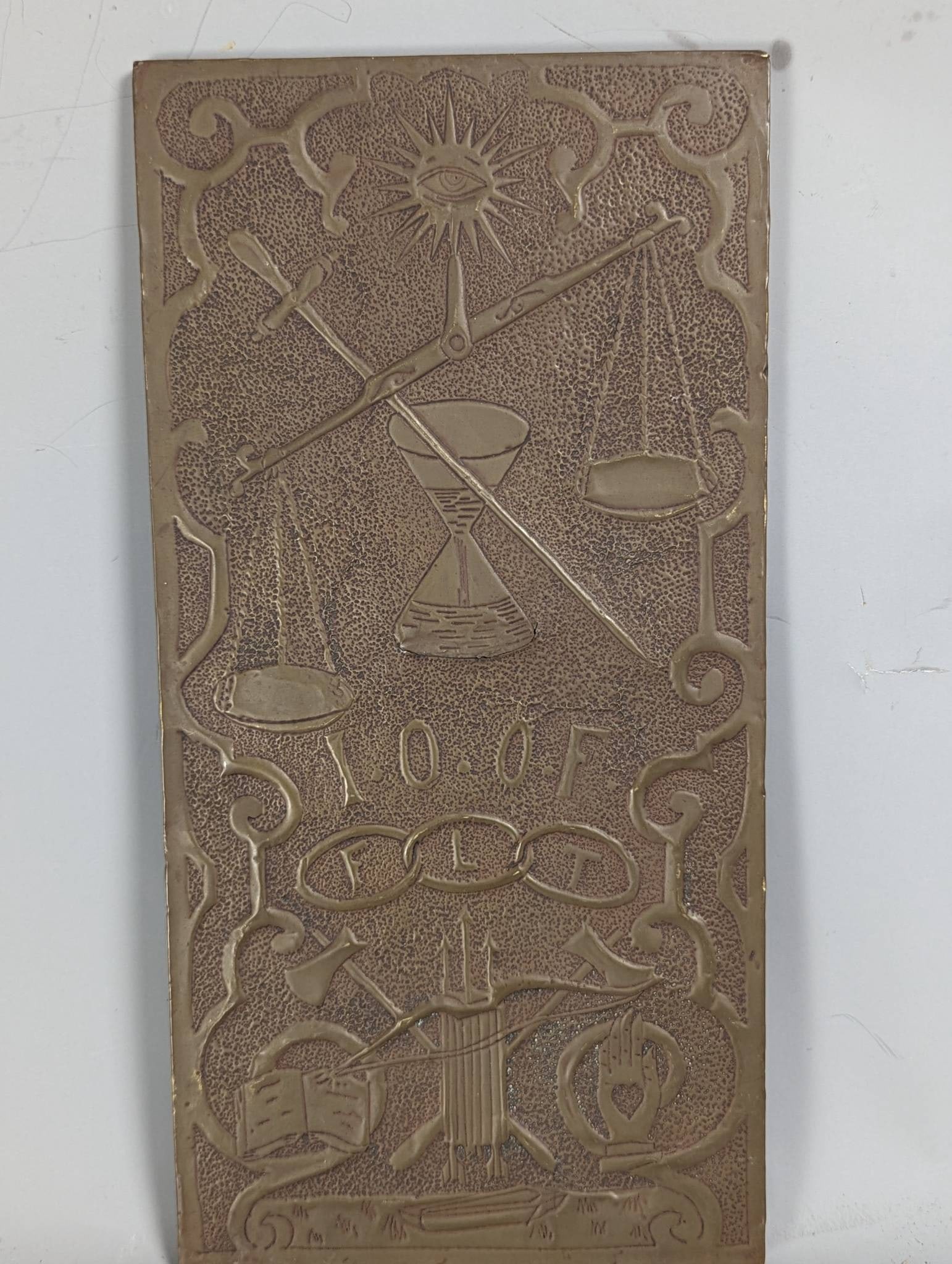 Odd Fellows Engraving Template c1910: Engraved brass template or die likely from 1910, designed for use with a pantograph engraving machine. The template features symbols associated with the Independent Order of Odd Fellows (IOOF), includ