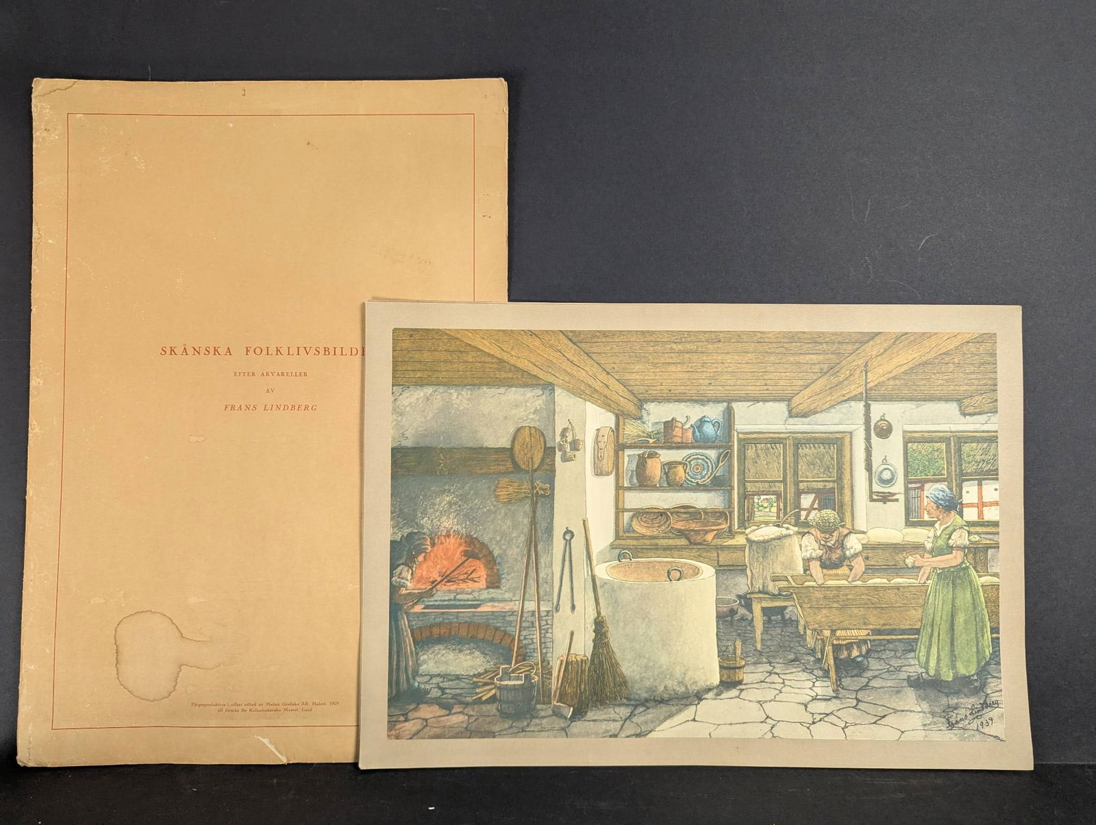 Skanska Folklivsbild by Frans Lindberg Depicting Scanian Folk Life: Skanska Folklivsbild (Scanian Folk Life Picture) by artist Frans Lindberg, a series of prints depicting historical scenes of Scanian folk life. The set captures detailed interiors of traditional homes