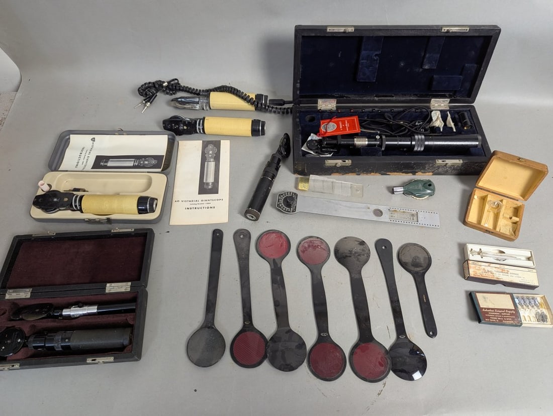 Collection of Vintage Optical Medical Devices by American Optical and More: **Important** Please read below description on how to avoid high shipping costs. Explore this exceptional lot featuring c1920's optical medical devices by American Optical and more. This collection in