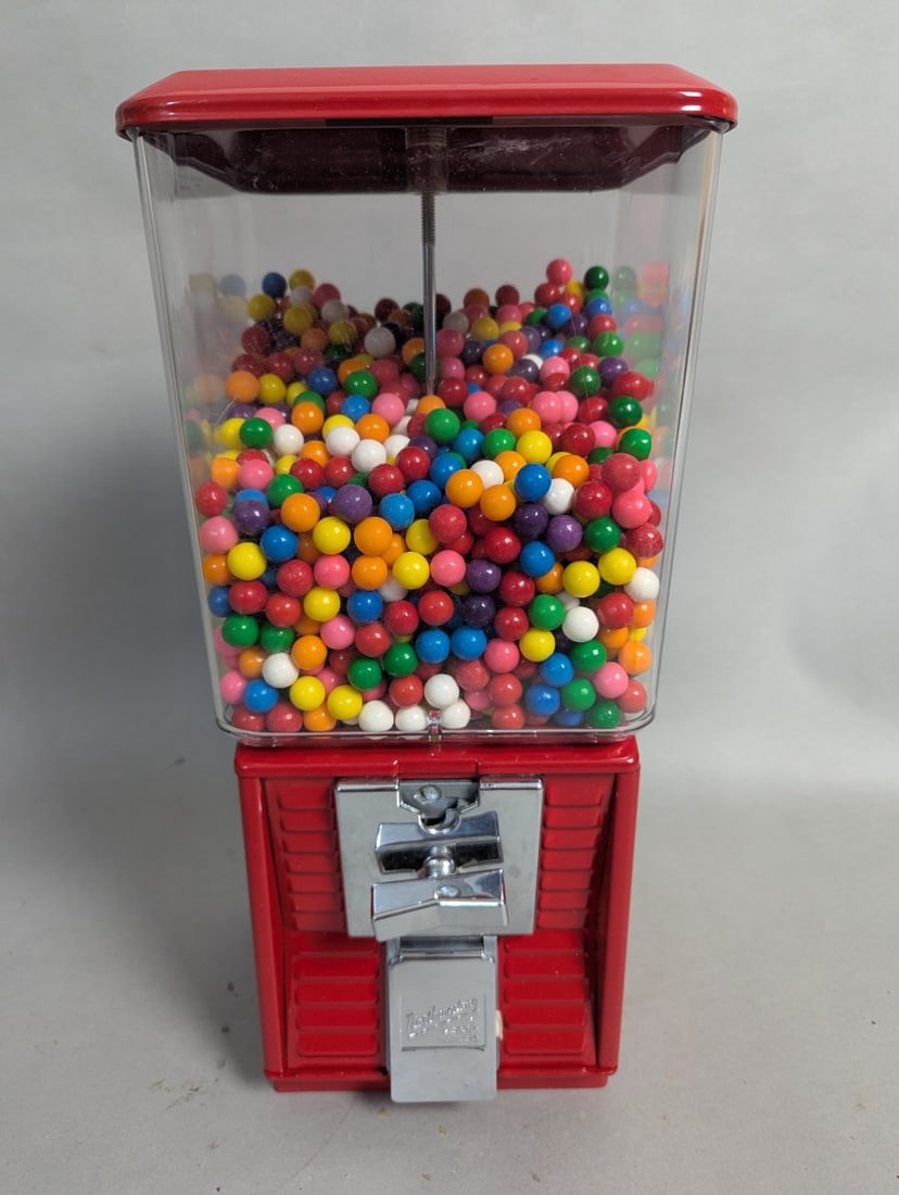 Vintage Northwestern Gumball Machine Classic Model 60 Red Dispenser: **Important** Please read below description on how to avoid high shipping costs. This classic Northwestern Gumball Machine stands at 17 high x 8 x 8, featuring a vibrant red casing and a clear globe f
