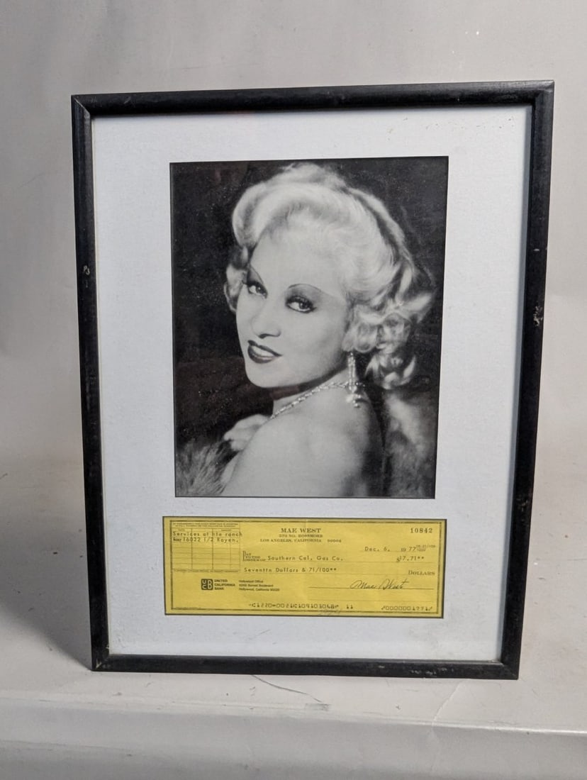 Framed Mae West Signed Check and Photograph Display Iconic Collectible: **Important** Please read below description on how to avoid high shipping costs. This stunning framed display features a signed check by the iconic Mae West, measuring 13 x 16 3/4. Added to this is