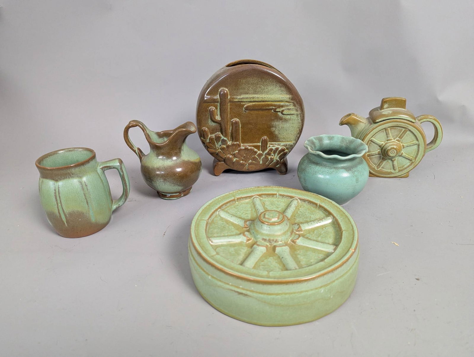 6 Art Pottery Items by Frankoma in Green and Brown Glaze: **Important** Please read below description on how to avoid high shipping costs. Six art pottery pieces in green and brown glaze, featuring various designs, by Frankoma and other makers. Largest vase