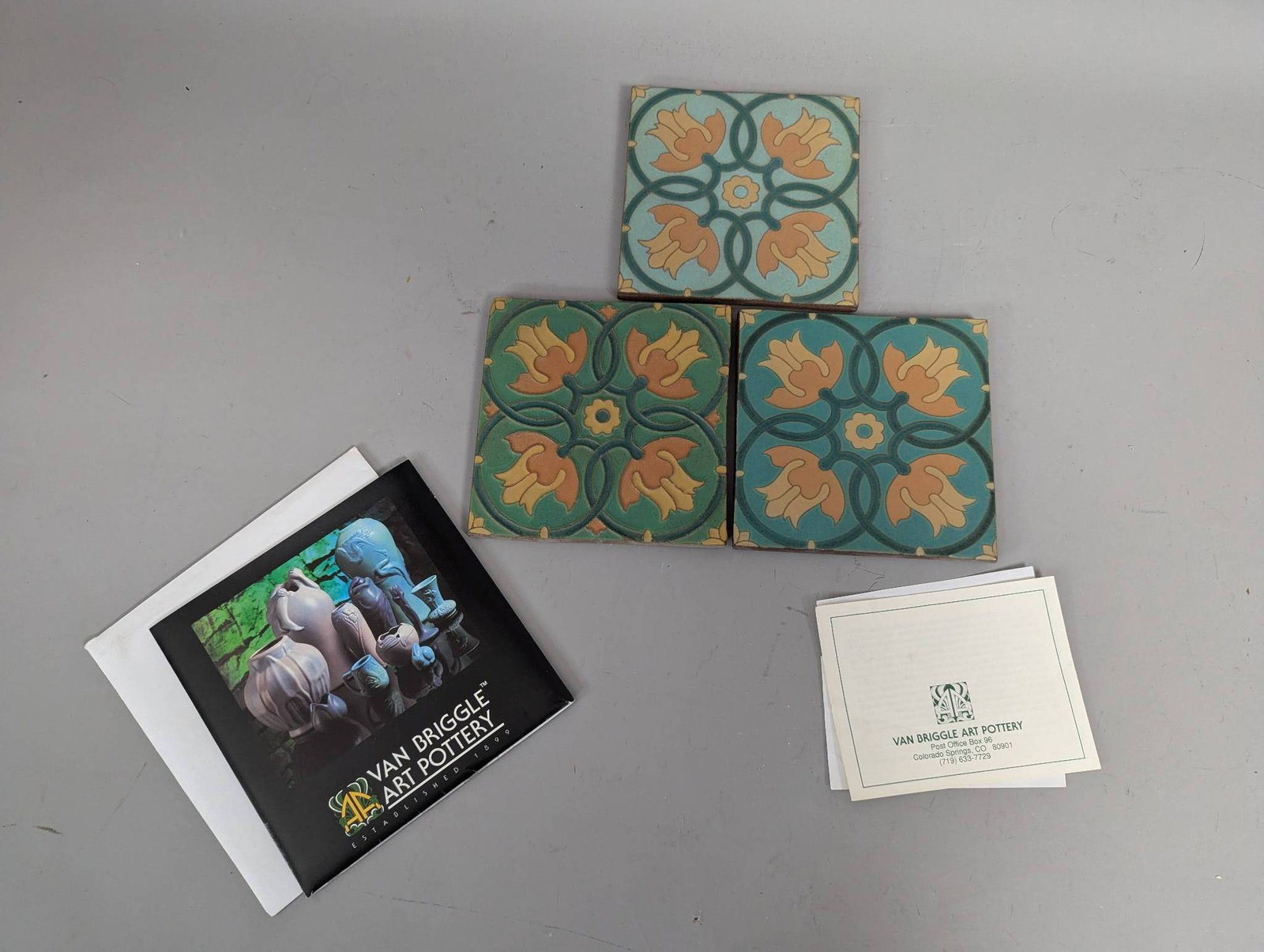 Set of 3 Van Briggle Art Pottery Tulip Matte Glaze Decorative Ceramic Tiles: **Important** Please read below description on how to avoid high shipping costs. Van Briggle decorative art pottery tiles featuring a tulip-inspired geometric floral design. These tiles showcase the r