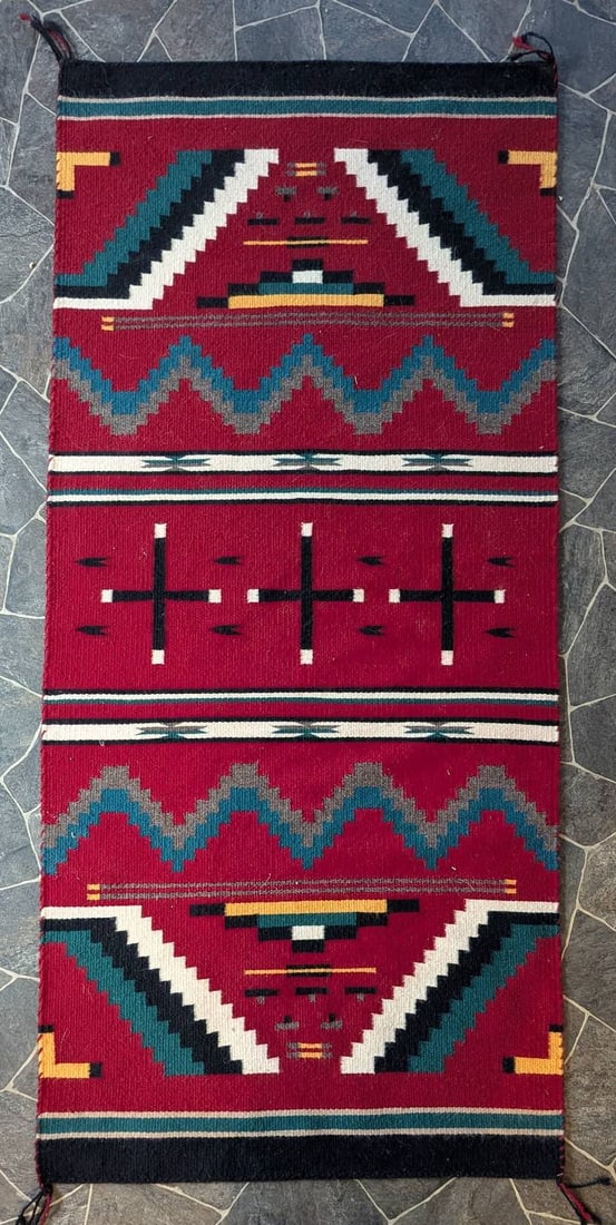 Navajo Wool Rug with Geometric Patterns c1980s: **Important** Please read below description on how to avoid high shipping costs. Navajo wool rug featuring vibrant geometric patterns in red, teal, black, white, and yellow. Created circa 1980s, the