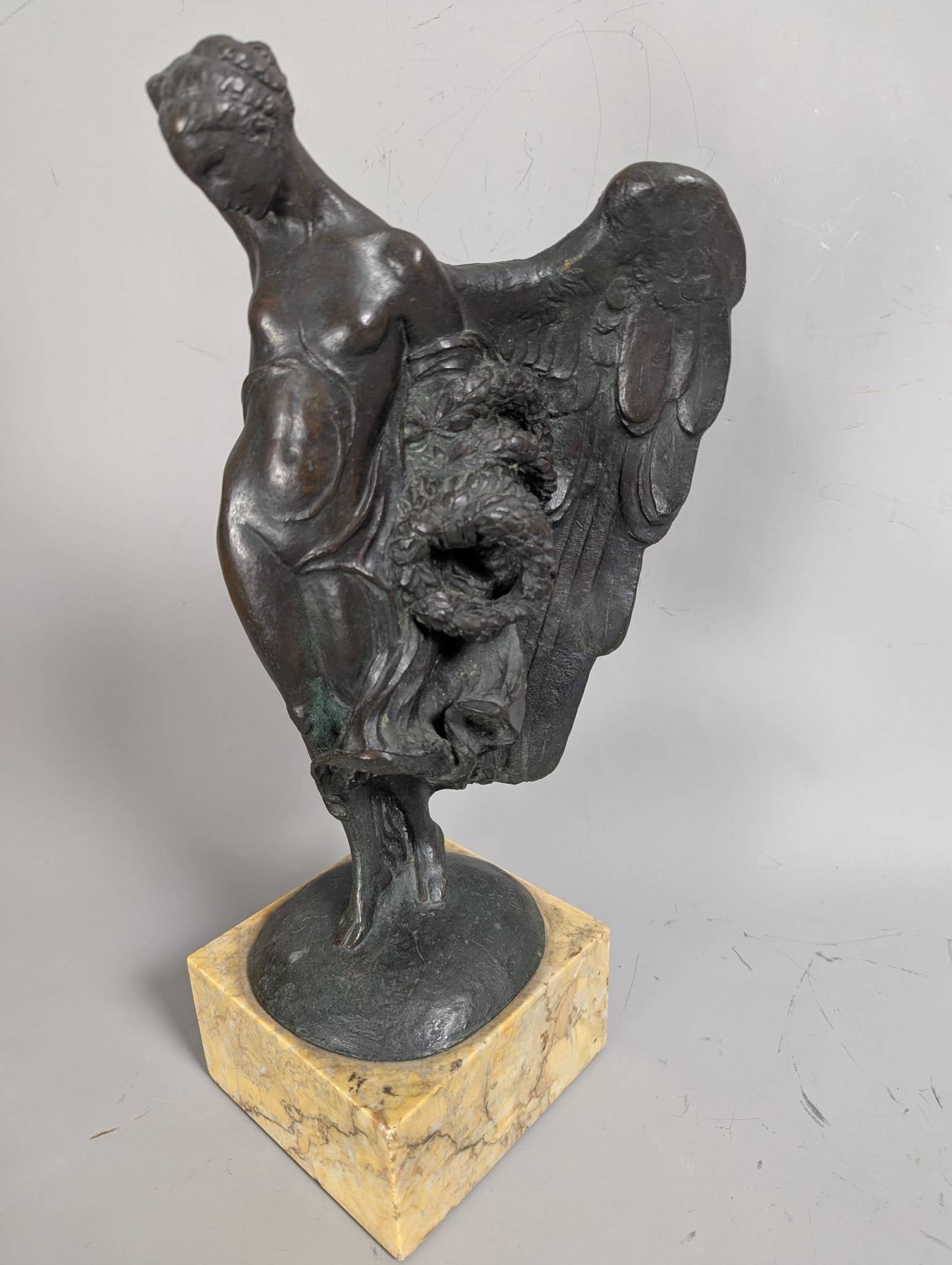Signed Bronze Angel Sculpture on Marble Base: **Important** Please read below description on how to avoid high shipping costs. Bronze sculpture of an angel, standing 13 1/2 inches high atop a 2 2/3-inch-high marble base. The base measures 11