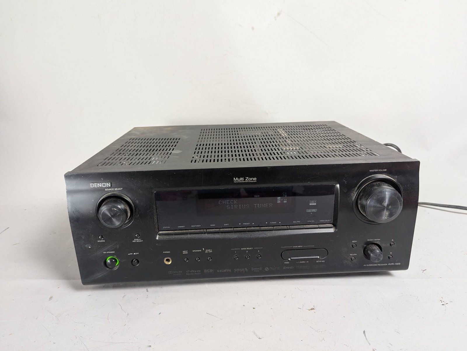 Denon AVR-1909 AV Surround Receiver with Multi Zone Capability: **Important** Please read below description on how to avoid high shipping costs. Denon AVR-1909 AV Surround Receiver featuring multiple input and output options, multi-zone capability, and