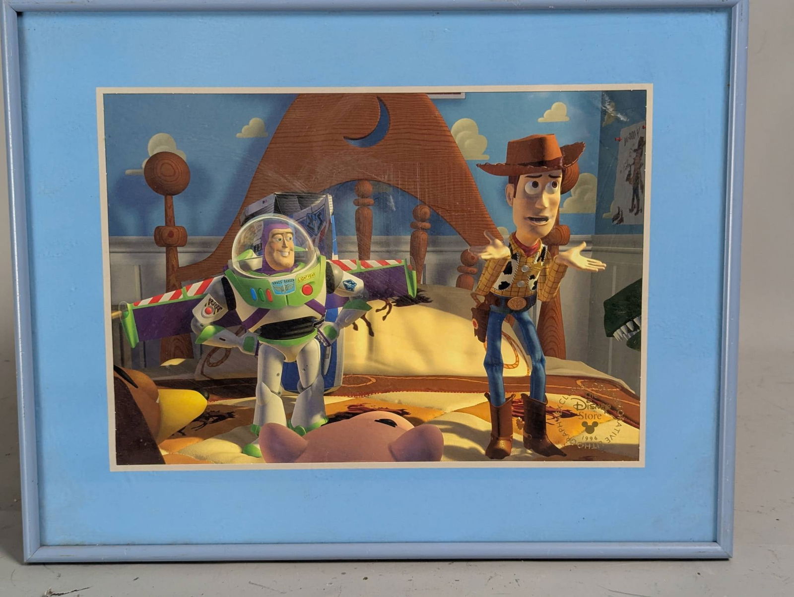 Framed 1996 Disney Store Exclusive Toy Story Commemorative Lithograph: **Important** Please read below description on how to avoid high shipping costs. Framed 1996 Disney Store exclusive Toy Story commemorative lithograph featuring characters Buzz Lightyear and Woody. Th