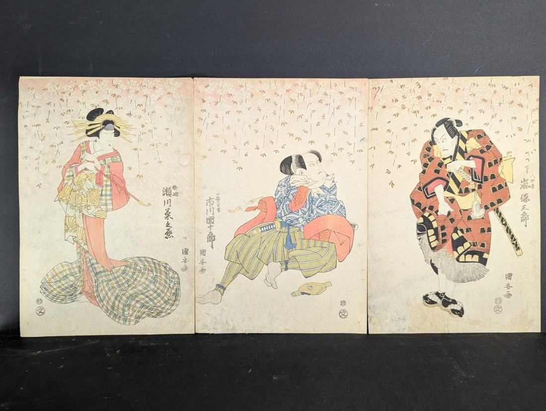 Utagawa Kunisada Kamuki Triptych Japanese Woodblock Print: **Important** Please read below description on how to avoid high shipping costs. This exquisite triptych by renowned artist Utagawa Kunisada (Toyokuni III) captures a dynamic kabuki scene featuring