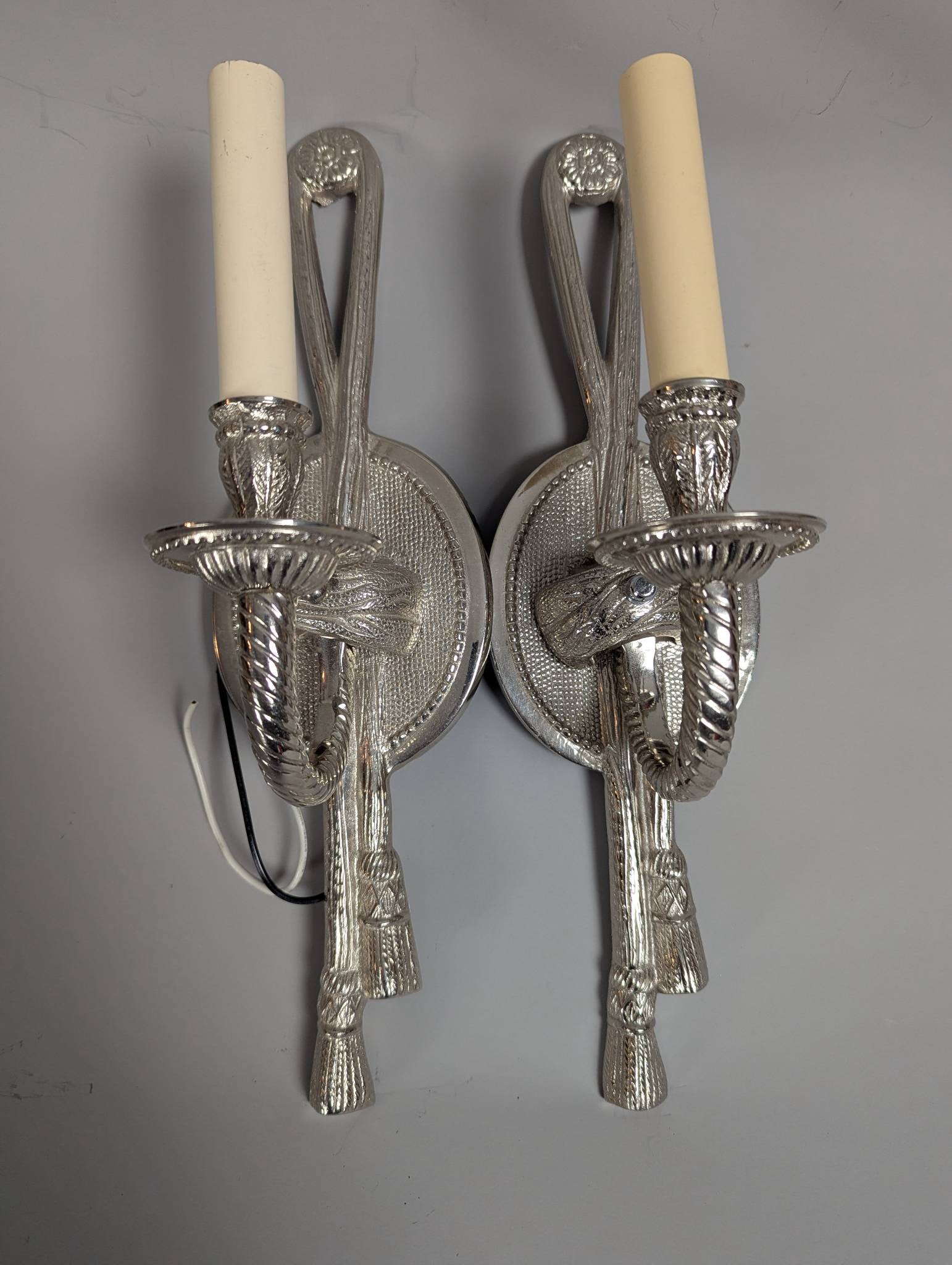 San Clemente Cast Brass Tassel Wall Sconces with Neoclassical Design: **Important** Please read below description on how to avoid high shipping costs. San Clemente cast brass tassel wall sconces, showcasing a neoclassical and Hollywood Regency-inspired design.