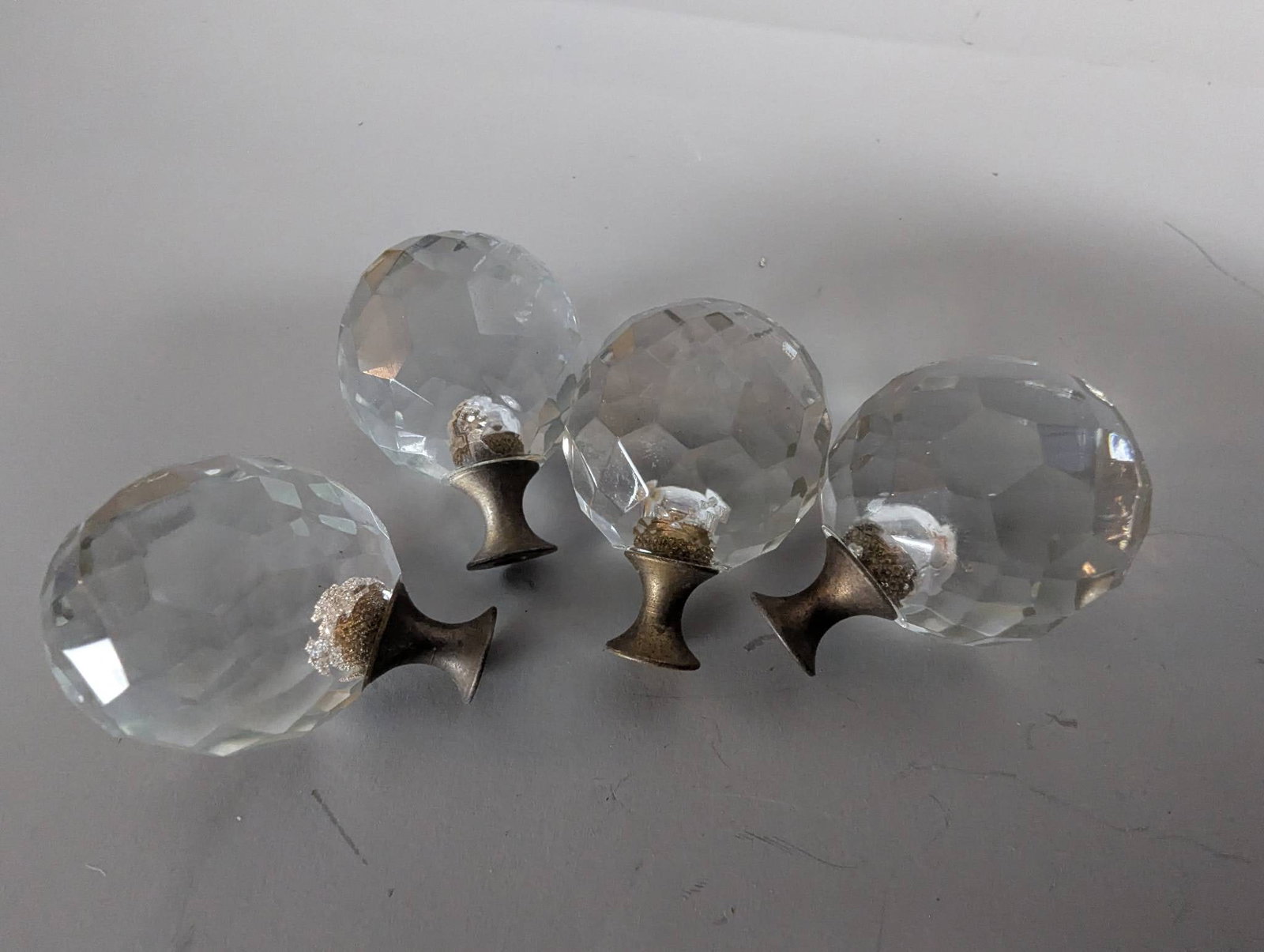 Vintage Faceted Crystal Ball Lamp Finials with Antique Brass Base: **Important** Please read below description on how to avoid high shipping costs. 4 vintage faceted crystal ball lamp finials featuring an antique brass base. Each measures 2 inches high, 1 1/8 inches 