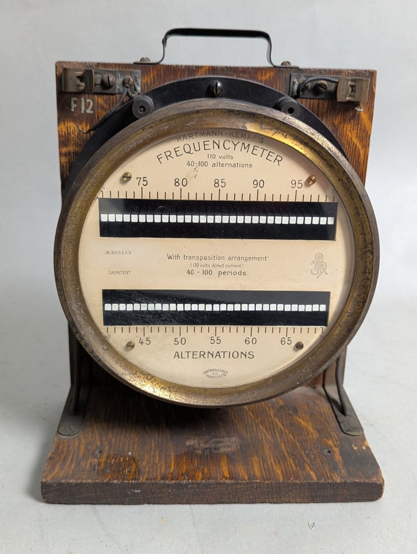 Antique Hartmann-Kempf Frequencymeter Hartmann & Braun Steampunk Industrial Decor: **Important** Please read below description on how to avoid high shipping costs. Experience a piece of history with this Antique Hartmann-Kempf's Frequencymeter by Hartmann & Braun. Measuring 11 high 