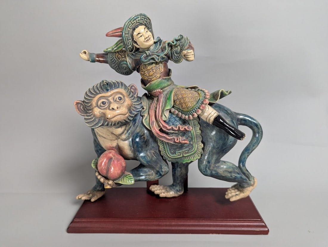 Chinese Sancai-Style Glazed Figural Sculpture Warrior on Monkey Xu Family Mark: **Important** Please read below description on how to avoid high shipping costs. Discover this stunning Chinese Sancai-Style Glazed Earthenware Figure of a Warrior on a Monkey, measuring 14 inches
