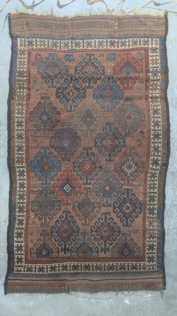 Mid 19th Century Authentic Baluchi Tribal Rug Handcrafted Wool Latch Hook Design: **Important** Please read below description on how to avoid high shipping costs. Discover this mid 19th century Baluchi rug, measuring approximately 3 foot 3 inches x 5 foot 5 inches. This striking