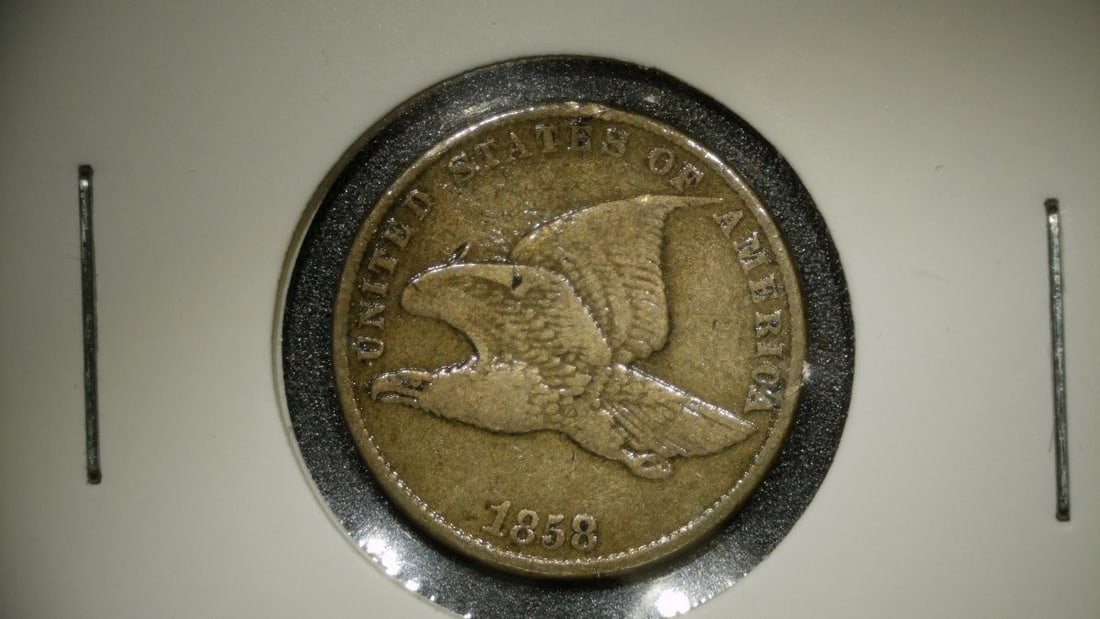 1858 Flying Eagle Cent Very Fine VF - James B. Longacre Design - Collectible Coin: **Important** Please read below description on how to avoid high shipping costs. This is an 1858 Flying Eagle Cent, a one-cent piece from the United States of America. The obverse features a flying