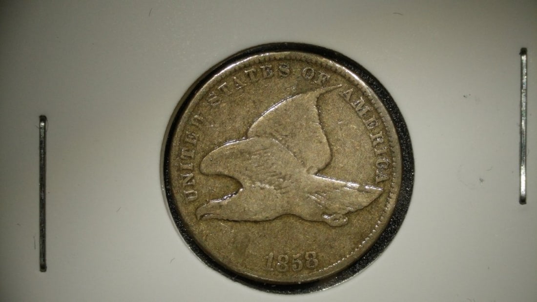 1858 Flying Eagle Cent by James B. Longacre - Very Good (VG) - Rare Collectible Coin: **Important** Please read below description on how to avoid high shipping costs. This 1858 Flying Eagle Cent, graded as Very Good (VG), is a remarkable piece from a short-lived series produced for