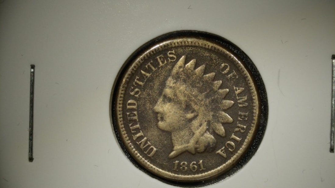 1861 Indian Head Cent G, Civil War Era, United States Mint, Copper-Nickel Coin: **Important** Please read below description on how to avoid high shipping costs. This auction features an 1861 Indian Head Cent graded as Good (G). This Civil War-era coin showcases significant, even