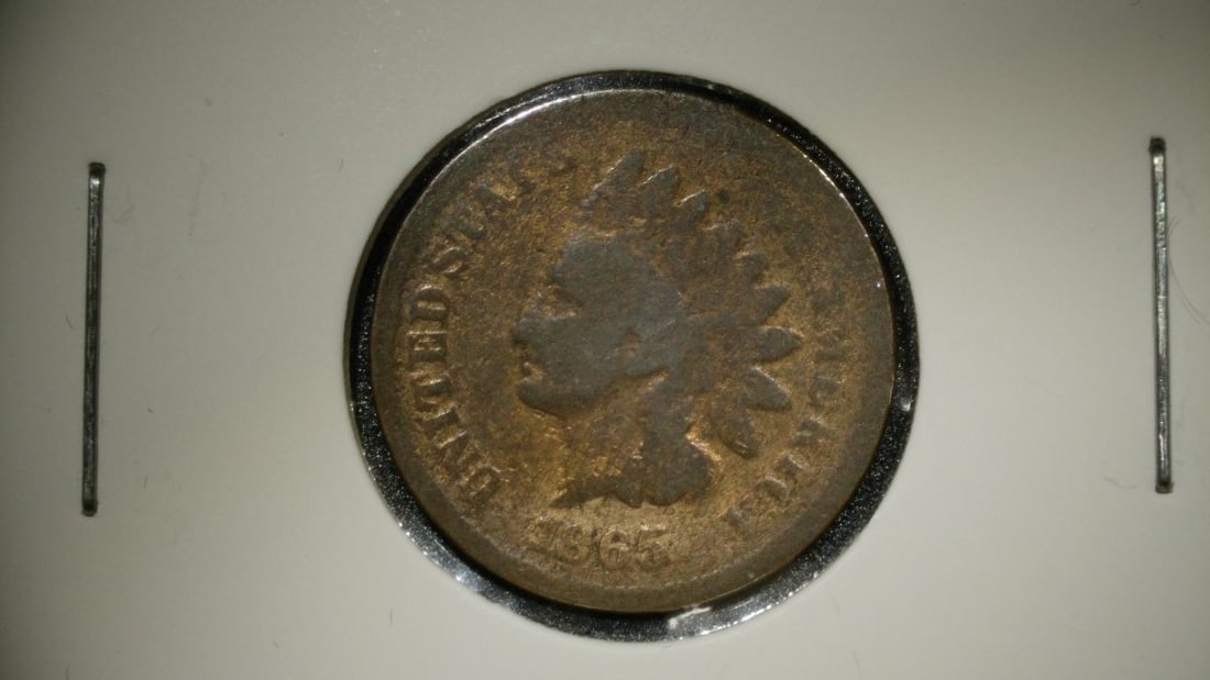 1865 Indian Head Cent Penny By James Barton Longacre - About Good AG Coin: **Important** Please read below description on how to avoid high shipping costs. This is an 1865 Indian Head Cent, a classic American one-cent piece from the Civil War era. The coin exhibits heavy