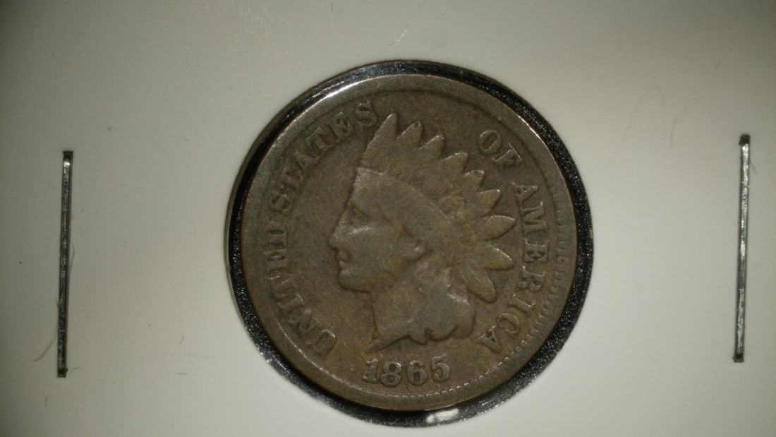 1865 Indian Head Cent Fine Grade Coin - Civil War Era, James B. Longacre Design: **Important** Please read below description on how to avoid high shipping costs. This auction presents a historically significant 1865 Indian Head Cent, graded Fine (F) by a professional grading servi
