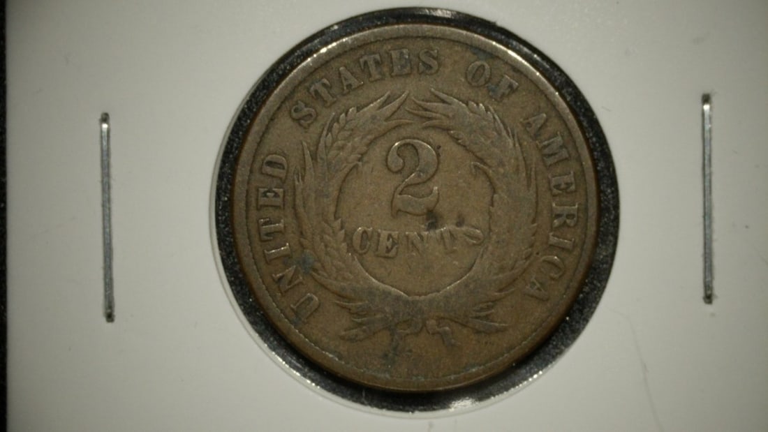 1869 United States Two Cent Piece G Good James Barton Longacre Coin: **Important** Please read below description on how to avoid high shipping costs. This is a historically significant 1869 United States Two Cent Piece with a 'Good' (G) grade. The coin exhibits heavy, 