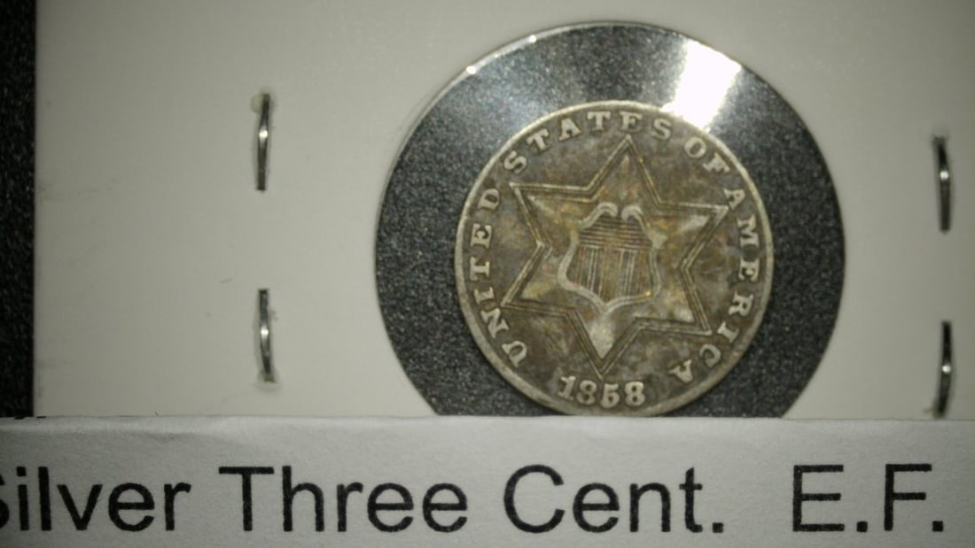 1858 Silver Three-Cent Piece (Trime) E.F. by James B. Longacre - Rare Coin: **Important** Please read below description on how to avoid high shipping costs. Presenting an exquisite 1858 United States Silver Three-Cent Piece, commonly referred to as a 'trime'. This coin is